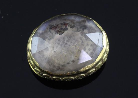 A late 17th century engraved gold mounted Stuart crystal mourning slide, 23mm.